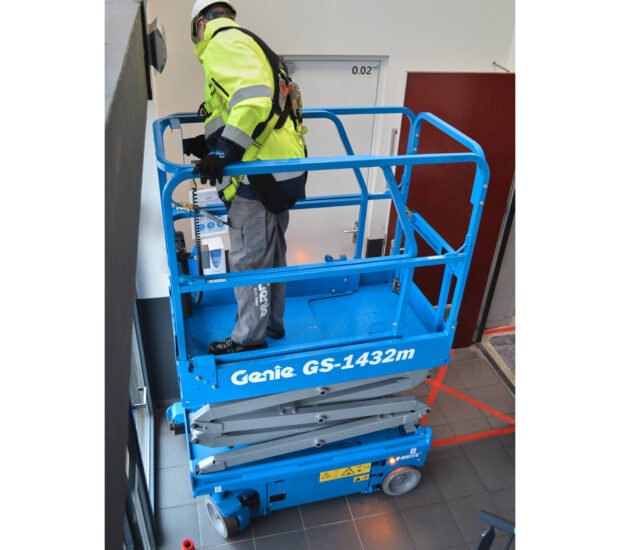 Genie® GS™-1432m E-Drive scissor lift is equipped with an efficient, all-electric AC drive system that offers unmatched productivity for getting around indoor and outdoor jobsites in a compact, lightweight and versatile package
